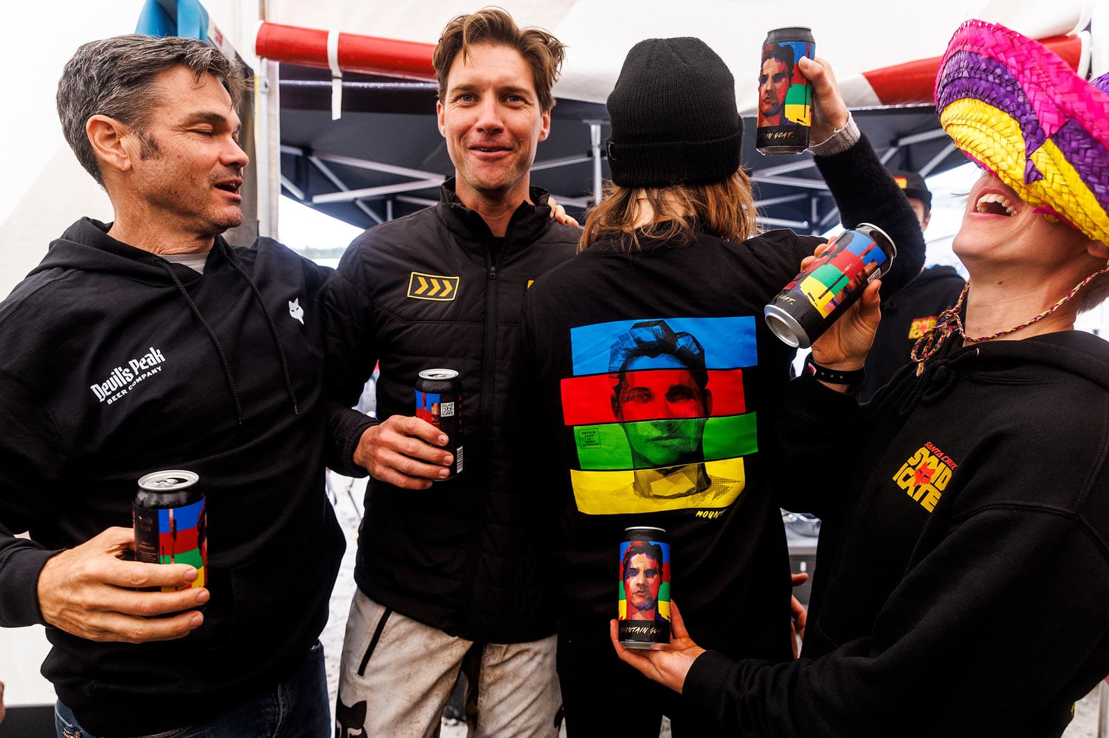 TOP LEFT: Greg Minnaar and friends enjoy a can of 'Mountain Goat', Minnaar's new signature beer. Drink responsibly. – Sven